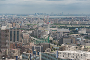 Fototapeta na wymiar Tokyo business district cityscape with commercial and residential skyscrapers