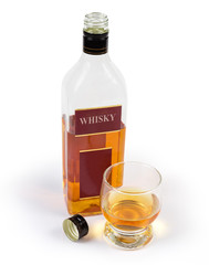 Bottle of whisky and glass whisky on a white background