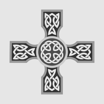 Celtic ornament in the shape of a cross. Isolated vector on a light background.