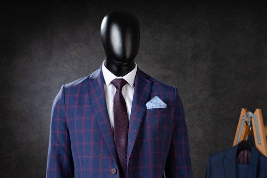 Male Suit On Mannequin In Studio