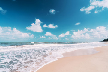 Beautiful tropical beach with blue sky and white clouds abstract texture background. Copy space of summer vacation and holiday business travel concept.