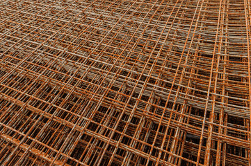 Rusty fittings. rusty construction metal mesh. Rusty Metal armature net for building construction. metal rebar for construction