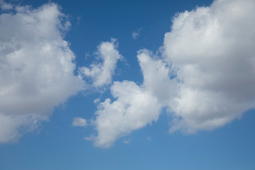 Obraz na płótnie Canvas fluffy clouds and blue sky