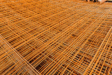 Rusty fittings. rusty construction metal mesh. Rusty Metal armature net for building construction. metal rebar for construction