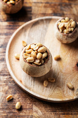 Salt peanut on the wooden table