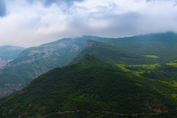 Obraz premium Beautiful tall and picturesque mountains of Armenia on a cloudy summer day