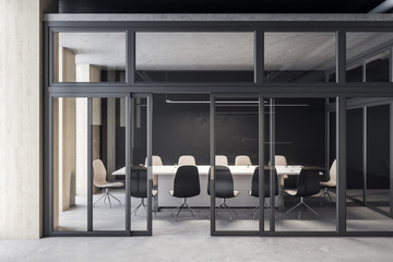 Bright meeting room interior with blank black wall.