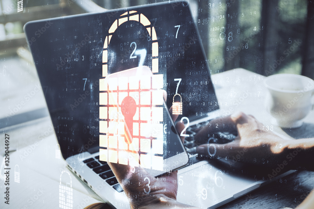Poster Hand using of laptop with creative glowing padlock interface.