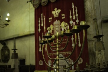 Staronova Synagogue, Prague, Czech Republic - 31 December 2019: a golden seven-pointed candle holder