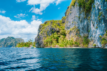 Naklejka na ściany i meble Tropical paradise island with huge impressive mountains rocks, Philippines, Southeast Asia