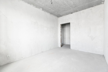 Obraz premium interior of the apartment without decoration in gray colors