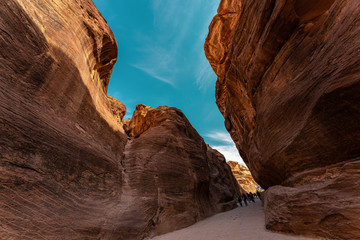Passage through Sik canyon to the temple-mausoleum of Al Khaznen in the city of Petra in Jordan. 