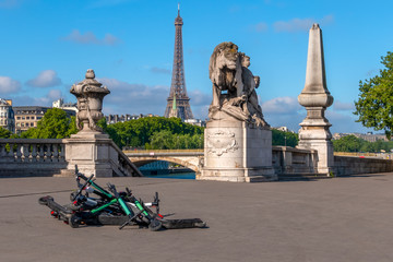 Pile of Electric Scooters on the Seine Embankment