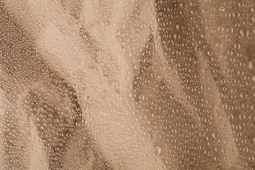 water drops brown crumpled background texture