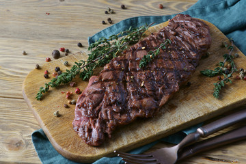skirt steak on a wooden background