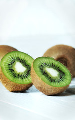 kiwi fruit isolated on white wooden background fresh