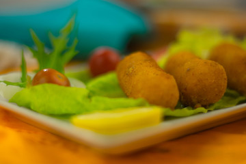 chicken croquettes in a bowl on the table to eat them