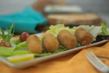 Chicken croquettes in dish on the table