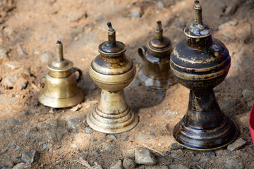Fototapeta na wymiar a collection of antique brass kerosene or oil lamps used in the country side in Asia