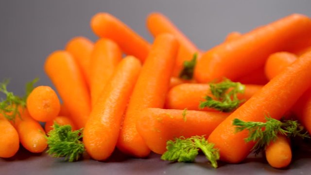 carrot- fresh organic carrot and parsley- slow motion