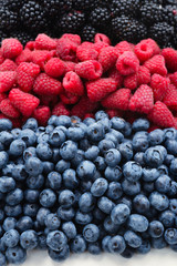 Blackberry, raspberry, blueberry background.  Top view.