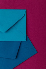 Colorful envelopes on a purple background.