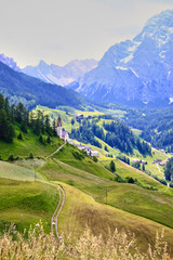 Fototapeta na wymiar Alpine mountain landscape on a clear sunny day