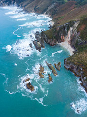 Fototapeta premium Aerial view of the coast around La Franca beach, Coastal landscape, Cantabrian Sea, Ribadedeva, Asturias, Spain, Europe