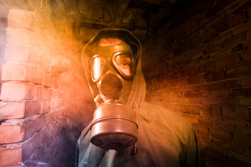 environmental disaster man wearing gas mask