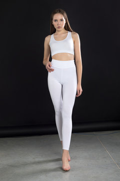 Girl In White Blank Leggings And A Crop Top. Mock-up. Stock Photo, Picture  and Royalty Free Image. Image 141943505.