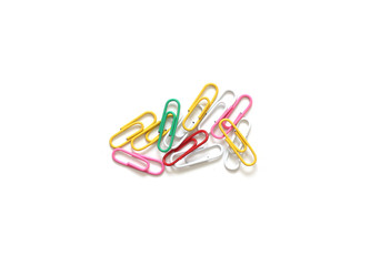 Colored paper clips on white background