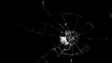 Detail of shattered glass on black background