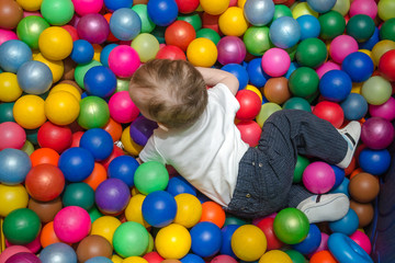 Fototapeta na wymiar children playing with colorful balls
