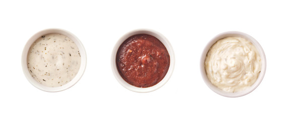 Set of different sauces isolated on white background, top view.