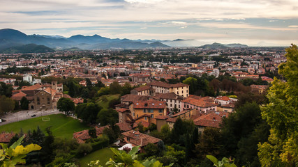 Fototapeta na wymiar panoramic mountains and city view from the castle of Rocca (Rocca di Bergamo), Bergamo, Italy