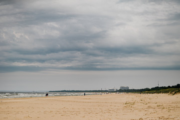 beautiful view of clouds sand and seashore