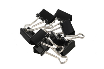 lots of stationery clips on a white background
