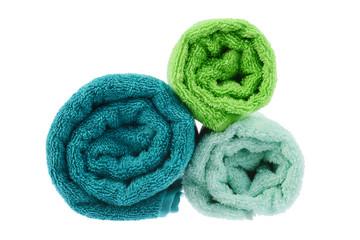 three twisted towels on the side of the isolate
