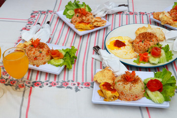 nasi goreng. indonesia fried rice well served on the table