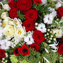 Obraz na płótnie Canvas Flower arrangement background with roses