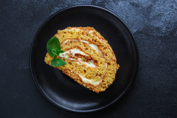 biscuit cake roll (delicious sweet honey dessert) menu concept. background. top view. copy space