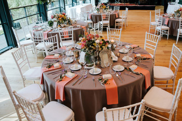 Beautiful, decorated table with flower decorations.  Wedding or party decorations.