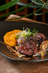 Haute cuisine/Asian fusion, roasted beef fillet with purree