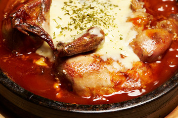 Roasted chicken with sauce and cheese 