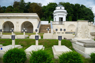 Obraz premium Cemetery of the defenders of Lviv - Lviv eagles. Lychakiv memorial cemetery in Lviv. Burial places of Polish defenders of Lviv. Many stone white crosses. Lviv, Ukraine, July 19, 2018