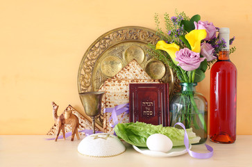 Pesah celebration concept (jewish Passover holiday). Traditional book with text in hebrew: Passover Haggadah (Passover Tale)