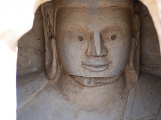 Fototapeta na wymiar 洞窟に掘られた悟りを開いた仏像