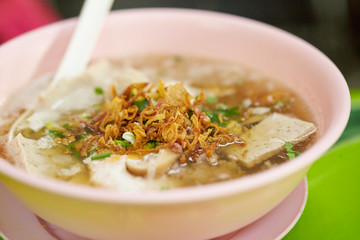 Tofu soup bowl at food market 