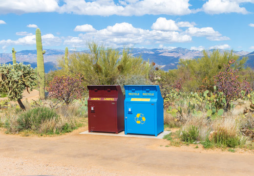 Garbage and recycling bins in the desert