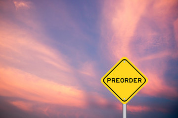 Yellow transportation sign with word preorder on violet sky background
